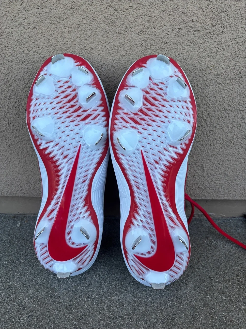 Nike White and Red Softball Cleats with Red Swoosh